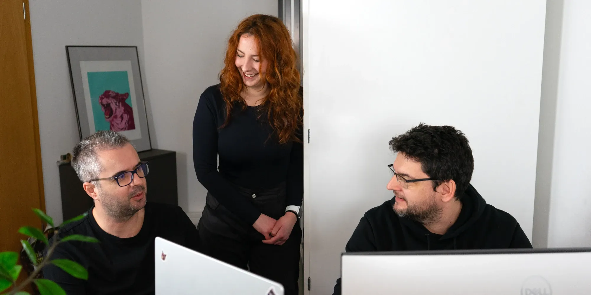 Backend lead in a team discussion with colleagues